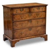 A GEORGE I WALNUT CHEST OF DRAWERS