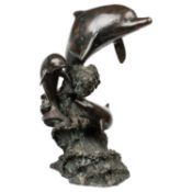 A BRONZE GROUP OF DOLPHINS
