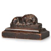 A 19TH CENTURY OAK CARVING OF A LION