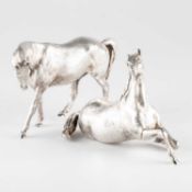 A PAIR OF ELIZABETH II CAST SILVER MODELS OF HORSES