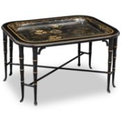 A PÂPIER-MACHÉ AND SIMULATED BAMBOO COFFEE TABLE