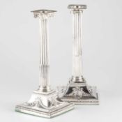 A PAIR OF GEORGE III SILVER COLUMNAR CANDLESTICKS