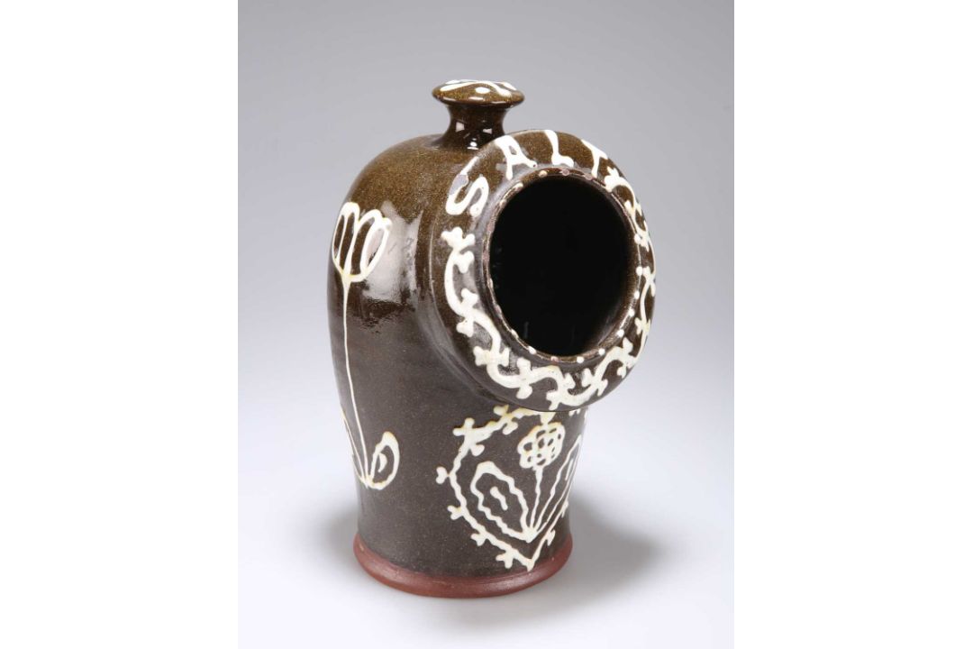 A SLIP-DECORATED SALT-GLAZED SALT PIG - Image 1 of 2