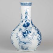 A CHINESE BLUE AND WHITE BOTTLE VASE
