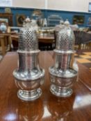 A PAIR OF GEORGE II SILVER CASTERS
