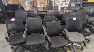 conference table and rolling office chairs