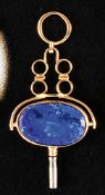 Pocket watch key, 14 ct. gold setting, rotating, with oval lapis lazuli 