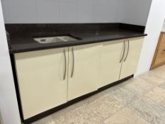 Entire Kitchen Display Section Comprising; Granite Worktop with Integrated Drainage Grooves,