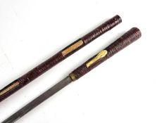An unusual Indian sword cane, circa 1900, decorated with a snake