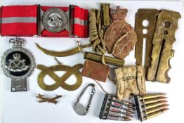 A mixed assortment of militaria comprising 