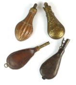 Four shot and powder flasks, 19th century