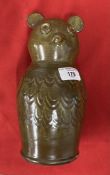 20th cent. Studio pottery money box in the form of an owl, the slip glaze with a pattern to simulate