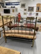 Early 20th cent. Brass framed double bed on castors. 6ft. 6ins. x 4ft. 6ins.