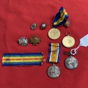 Militaria: Wiltshire Regiment WWI Private F. Fortune 25961 pair plus cap badges, T.A and B.L.