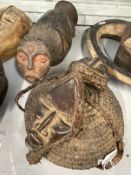 Tribal Art: Mambila mask with two heads and an Ambete mask and hat. (2)
