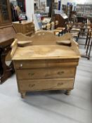Late 19th cent. Pine dressing chest of drawers with a shaped gallery, two shaped front small drawers