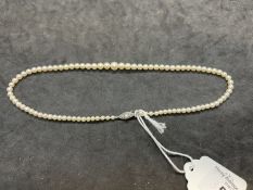 Jewellery: Necklet single row of (89) graduated cultured pearls attached to a 9ct white gold
