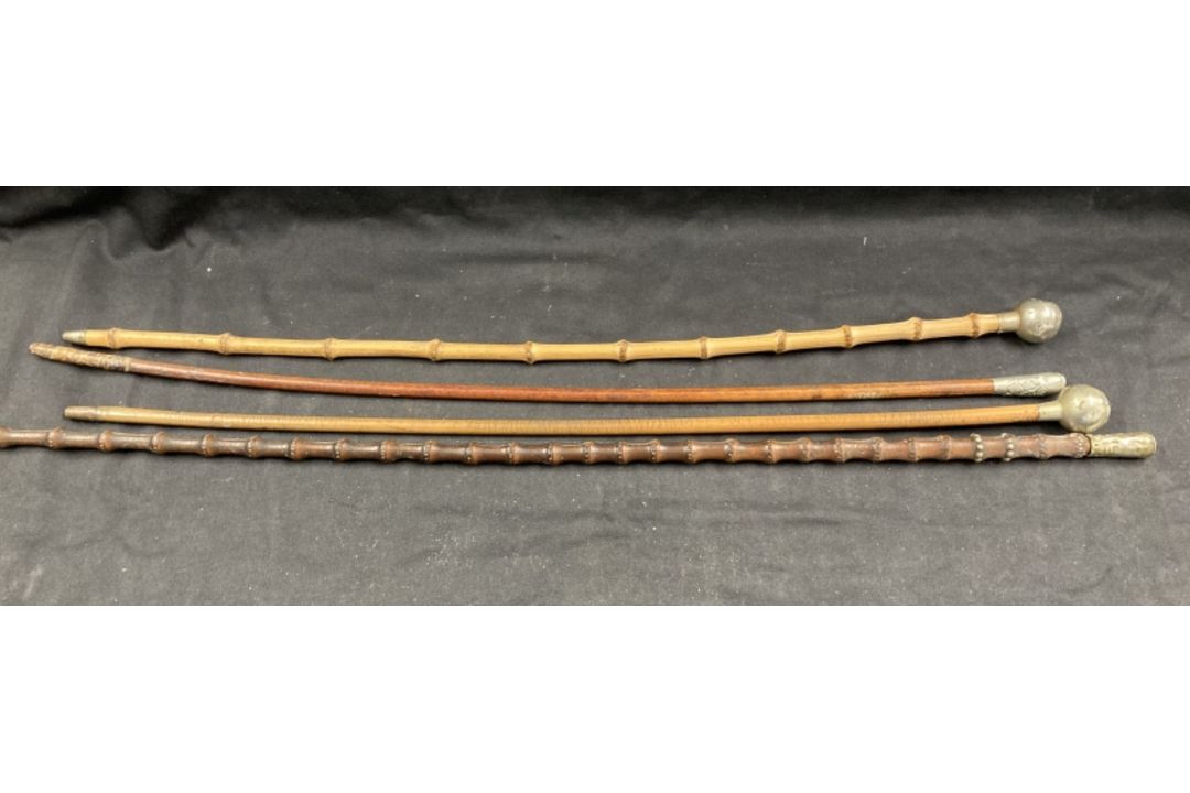 Militaria: Swagger sticks. Group of four, indistinct regiments, possibly St. Lawrence College, First - Image 1 of 2