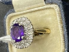 Hallmarked Jewellery: 9ct gold twenty-seven stone rectangular cluster. Centre set with an