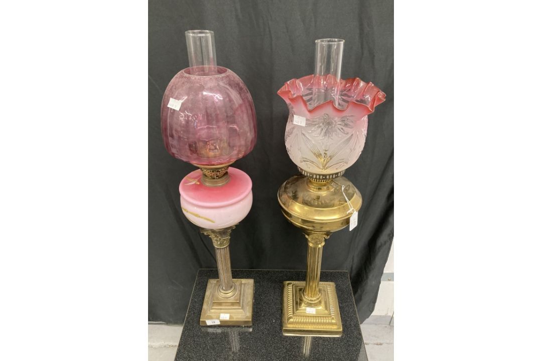Lighting: Two brass Corinthian column table lamps with reeded columns on stepped square bases, one