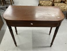 Early 19th cent. Mahogany tea table on turned ring supports. 35¼ins. x 17¼ins. x 34½ins.