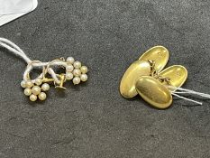 Hallmarked Jewellery: Pair of 18ct gold cufflinks. Weight 9.4g. Plus yellow metal pair of earrings