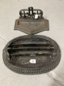 19th cent. Cast iron boot scrapers, one oval, one geometric.