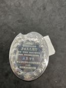 R.S.A. White metal, tests as silver presentation plaque in the shape of an artists palette, one side