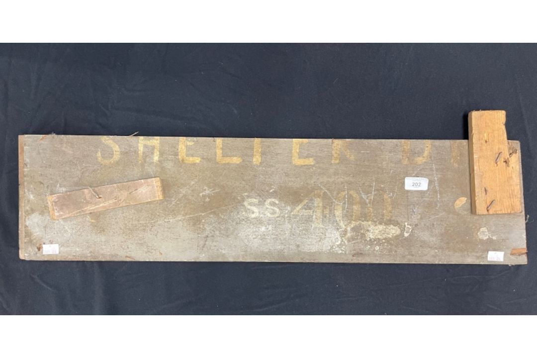 R.M.S. OLYMPIC: Birch First-Class Stateroom wood section stencilled SS400. 34ins. x 8ins.