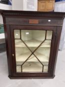 Late 18th cent. Mahogany corner cupboard, dental cornice above a small satinwood inlaid rectangle,