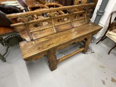 Chinese elm bench with weathered finish, shaped panelled back solid seat on shaped cut out legs with