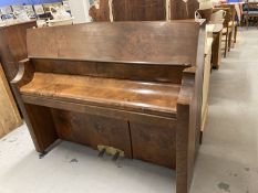 20th cent. Piano by Bentley, iron frame over strung in a rosewood and walnut case. Approx. 45ins.