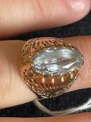 Jewellery: Yellow metal ring set with an oval cut aquamarine, estimated weight 2.75ct, tests as 14ct