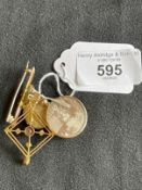 Jewellery: Yellow metal one oval locket, one round locket with glass front and a bar brooch, all