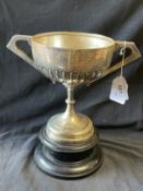 Hallmarked Silver: Trophy, double handles with melon decoration. Height 7ins. With a wooden