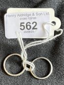 Jewellery: White metal two rings one 2mm plain band, ring size L, weight 1.5g. The other 2mm set