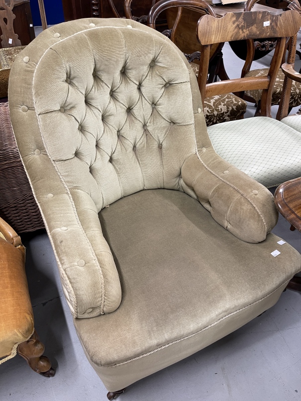 20th cent. Two nursing armchairs, one carved walnut on ceramic castors upholstered in brown, the - Image 2 of 2