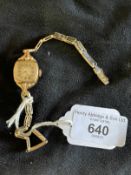 Watches: Ladies yellow metal wristwatch, cushion shaped dial with Arabic numerals attached to a