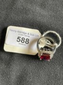 Hallmarked Jewellery: Ring, rectangular cluster set with a 5ct red tourmaline surrounded by nineteen