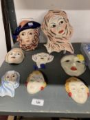 20th cent. Ceramics: Art Deco style Crown Devon pottery wall masks, hand painted and signed by