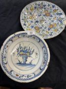 18th cent. Delftware polychrome charger with floral design. Dia. 11½ins. Plus a polychrome bowl with
