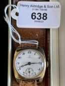 Watches: 9ct gold gentleman's Omega wristwatch, cushion shaped case, round white dial, black