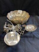 White metal Swiss silver stamped 800 fruit bowl, tea strainer and plated knife rests. Silver Total