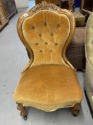 19th cent. Walnut button back nursing chair.