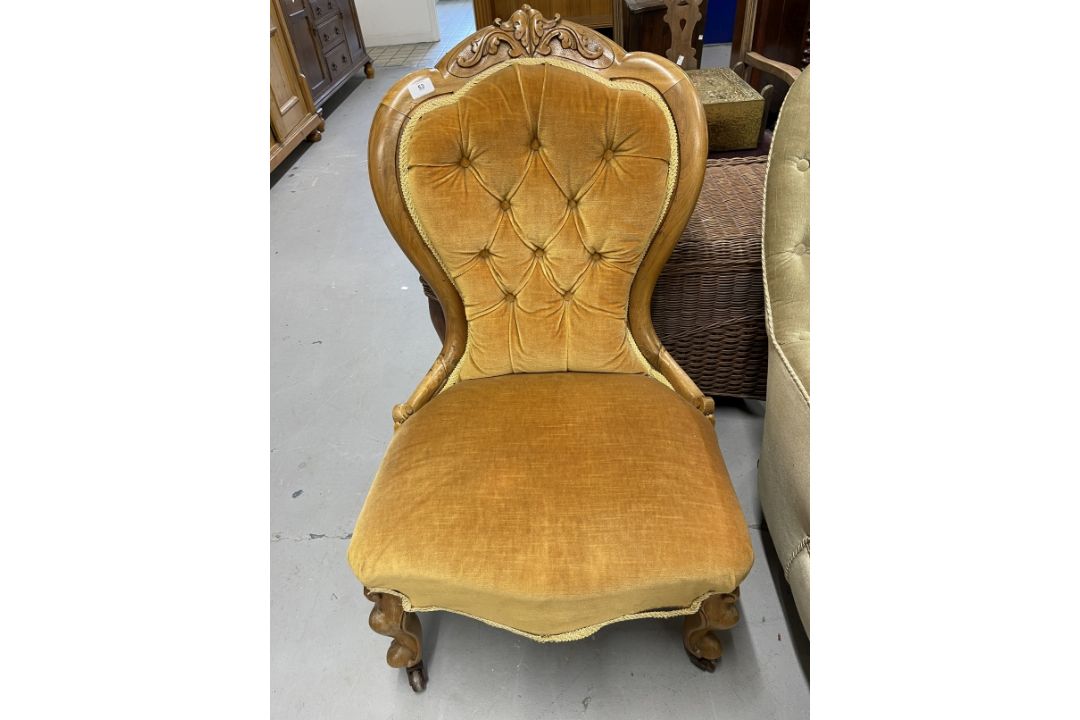 19th cent. Walnut button back nursing chair.