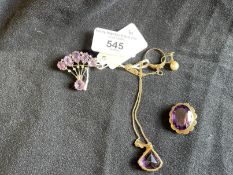 Yellow Metal Jewellery: One 18ins chain with a kite shaped amethyst pendant attached, a spray brooch
