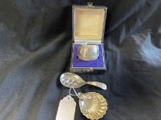Collection of silver items includes tea caddy spoon, salt and napkin rings. Total weight 2.3oz.