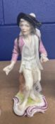 A Frankenthal figure of a pedlar c1760, modelled by J W Lanz, a large tied sack strapped to his