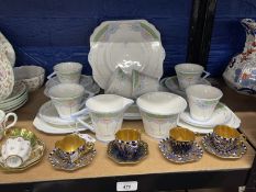 Art Deco Ceramics: Lawleys half tea service of geometric shape, pale blue and pink daisies