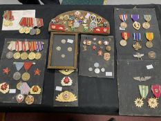 Military: USSR mounted in groups, post WWII and a side cap of enamel badges, together with USA